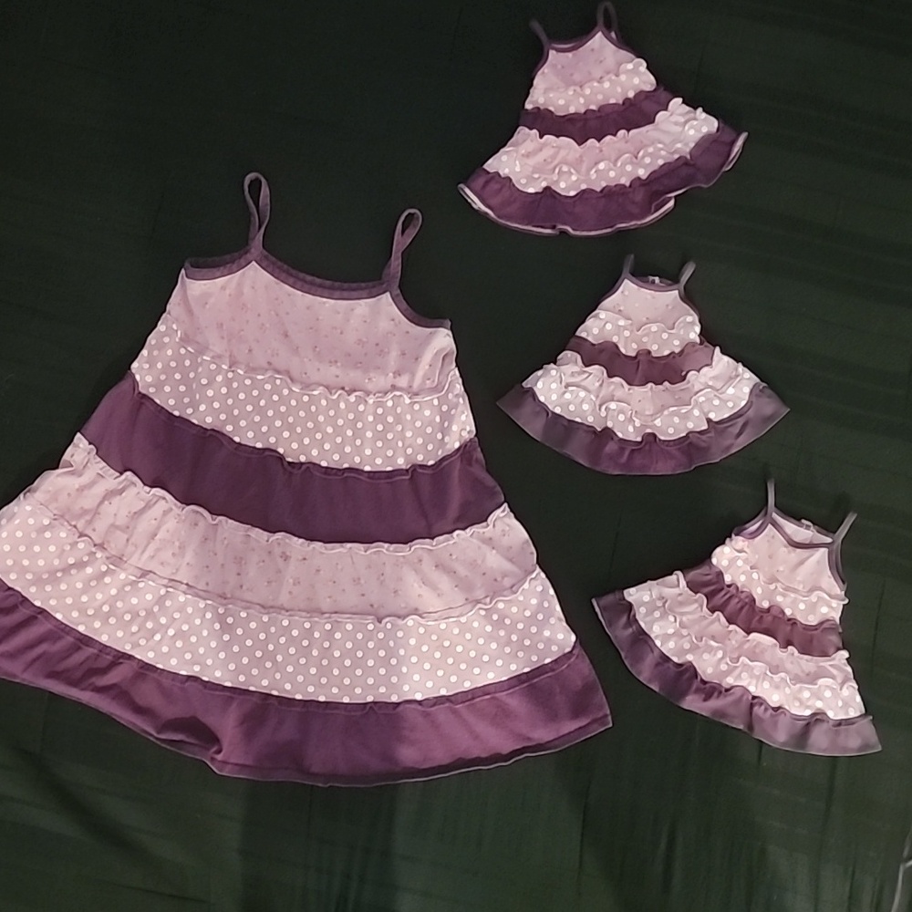 A purple sundress sundress with matching doll dresses.